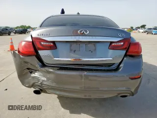 2015 Infiniti Q70 z VIN JN1BY1AR1FM561848, wystawiony jako Copart lot #56432875 z przebiegiem 145 158 mil mil oraz Szkody całkowita. Historia ofert i sprzedaży dostępna na DreamBid. Obrazek 6.