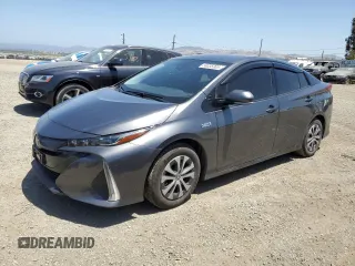 2020 Toyota Prius LE z VIN JTDKARFP0L3142737, wystawiony jako Copart lot #58035305 z przebiegiem 80 309 mil mil oraz Szkoda całkowita • Salvage title. Historia ofert i sprzedaży dostępna na DreamBid. Obrazek 1.