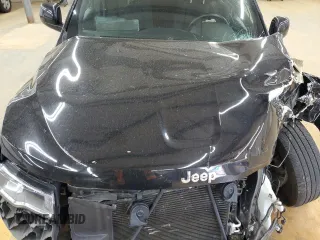 2018 Jeep Grand Cherokee Laredo E with VIN 1C4RJEAG9JC338428, listed as a Copart auction lot 52110635 with 88,137 mi miles and Salvage title. Bid and sale history available at DreamBid. Image 14.