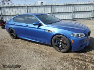 2016 BMW M5 with VIN WBSFV9C56GD595598, listed as a Copart auction lot 53042714 with 87,563 mi miles. Bid and sale history available at carsss.com. Image 4.
