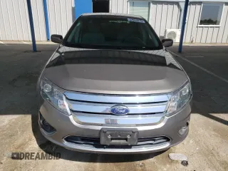 2012 Ford Fusion SE z VIN 3FAHP0HAXCR231865, wystawiony jako Copart lot #52644815 z przebiegiem 153 058 mil mil oraz Szkoda całkowita • Salvage title. Historia ofert i sprzedaży dostępna na DreamBid. Obrazek 5.