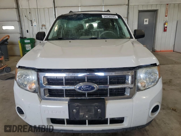 2012 Ford Escape XLS с VIN 1FMCU9C73CKA35456, выставлен на аукционе Copart как лот 54230285 с пробегом 174 263 миль миль и Списание • Salvage title. История ставок и продаж доступна на DreamBid. Изображение 5.