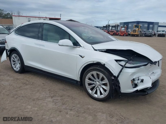 2020 Tesla Model X Long Range with VIN 5YJXCBE26LF234855, listed as a IAAI auction lot 41420701 with 101,202 mi miles. Bid and sale history available at carsss.com. Image 1.