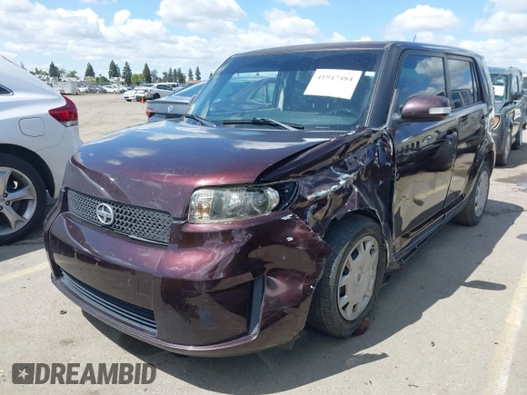 2008 Scion xB with VIN JTLKE50E281001793, listed as a IAAI auction lot 41947484 with 141,423 mi miles. Bid and sale history available at carsss.com. Image 2.