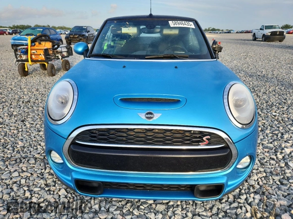 2018 MINI Convertible Cooper S с VIN WMWWG9C58J3E39013, выставлен на аукционе Copart как лот 58946435 с пробегом 66 992 миль миль и На запчасти • Non repairable. История ставок и продаж доступна на DreamBid. Изображение 5.