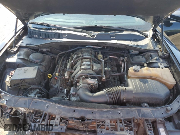 2018 Dodge Charger R/T z VIN 2C3CDXCT3JH158236, wystawiony jako Copart lot #53741025 z przebiegiem 126 914 mil mil oraz Szkoda całkowita • Salvage title. Historia ofert i sprzedaży dostępna na DreamBid. Obrazek 11.