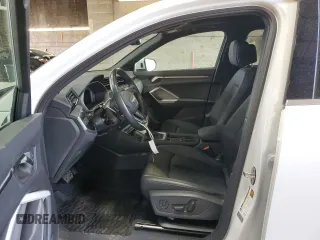 2021 Audi Q3 S line Premium z VIN WA1DECF33M1100304, wystawiony jako Copart lot #58722335 z przebiegiem 26 043 mil mil oraz Szkoda całkowita • Salvage title. Historia ofert i sprzedaży dostępna na DreamBid. Obrazek 7.