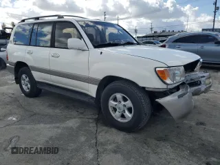 1999 Toyota Land Cruiser with VIN JT3HT05J7X0049786, listed as a Copart auction lot 45527005 with 199,447 mi miles and Salvage Title. Bid and sale history available at carsss.com. Image 4.