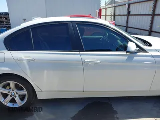 2015 BMW 3 Series 320i with VIN WBA3B1C53FK138341, listed as a IAAI auction lot 41757490 with 125,280 mi miles. Bid and sale history available at carsss.com. Image 13.
