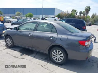 2013 Toyota Corolla L with VIN JTDBU4EE2DJ113876, listed as a IAAI auction lot 42044548 with 232,500 mi miles. Bid and sale history available at carsss.com. Image 3.