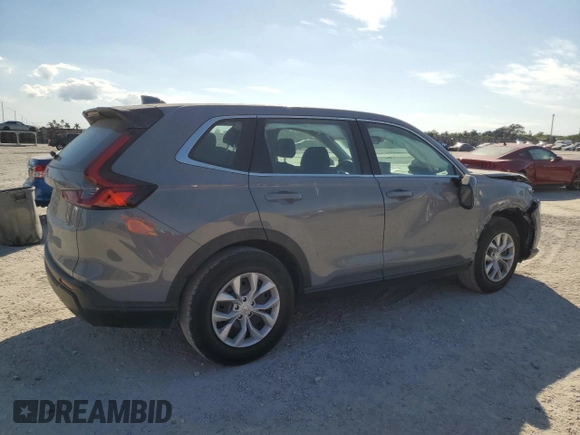 2024 Honda CR-V LX with VIN 2HKRS3H27RH317587, listed as a Copart auction lot 82719674 with 13,509 mi miles and Salvage Title. Bid and sale history available at DreamBid. Image 3.