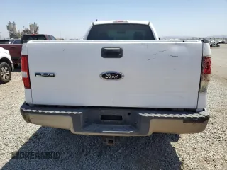 2005 Ford F-150 XL with VIN 1FTRF12255NB53669, listed as a Copart auction lot 61636135 with 156,562 mi miles and Salvage title. Bid and sale history available at DreamBid. Image 6.