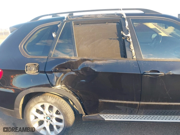 2011 BMW X5 35i with VIN 5UXZV4C54BL402935, listed as a IAAI auction lot 41198827 with 120,157 mi miles. Bid and sale history available at carsss.com. Image 6.