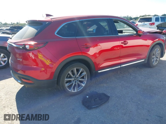 2023 Mazda CX-9 Grand Touring with VIN JM3TCBDY7P0632706, listed as a IAAI auction lot 41003307 with 44,221 mi miles and . Bid and sale history available at carsss.com. Image 4.