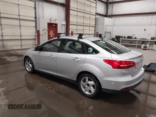 2015 Ford Focus SE with VIN 1FADP3F28FL231684, listed as a IAAI auction lot 41914284 with 100,195 mi miles. Bid and sale history available at carsss.com. Image 3.