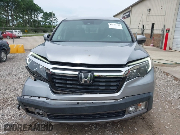 2019 Honda Ridgeline RTL-E with VIN 5FPYK3F75KB019660, listed as a IAAI auction lot 42548495 with 55,969 mi miles and . Bid and sale history available at DreamBid. Image 13.
