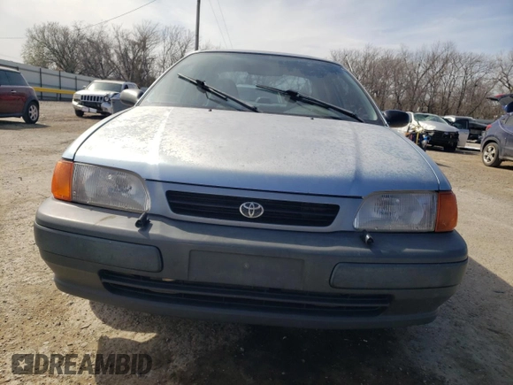 1997 Toyota Tercel CE z VIN JT2AC52L7V0212023, wystawiony jako Copart lot #49150285 z przebiegiem 74 742 mil mil oraz Czysty tytuł • Clean title. Historia ofert i sprzedaży dostępna na DreamBid. Obrazek 5.