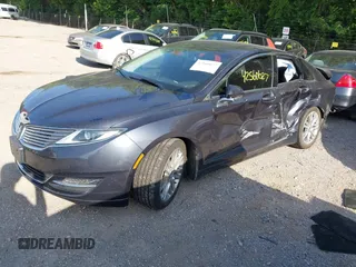 2014 Lincoln MKZ Hybrid z VIN 3LN6L2LU6ER803720, wystawiony jako IAAI lot #42560627 z przebiegiem 120 795 mil mil oraz . Historia ofert i sprzedaży dostępna na DreamBid. Obrazek 17.