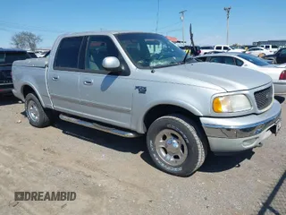 2001 Ford F-150 SuperCrew XLT with VIN 1FTRW08L61KA91589, listed as a IAAI auction lot 41898101 with 233,670 mi miles. Bid and sale history available at carsss.com. Image 1.