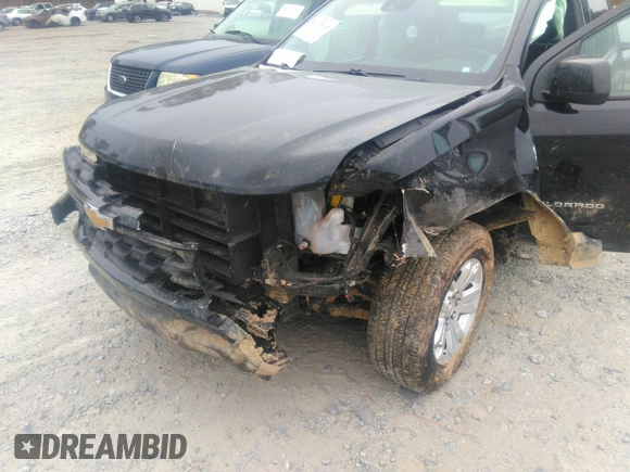 2021 Chevrolet Colorado 2WD LT with VIN 1GCHSCEA4M1256299, listed as a IAAI auction lot 41173669 with 90,969 mi miles and . Bid and sale history available at DreamBid. Image 6.