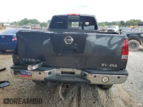 2012 Nissan Titan S z VIN 1N6AA0CJ9CN325160, wystawiony jako Copart lot #70004034 z przebiegiem 167 159 mil mil oraz Szkoda całkowita • Salvage title. Historia ofert i sprzedaży dostępna na DreamBid. Obrazek 6.