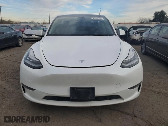 2023 Tesla Model Y Long Range with VIN 7SAYGDEE3PA130988, listed as a Copart auction lot 42172185 with 112,136 mi miles and Salvage Title. Bid and sale history available at DreamBid. Image 5.