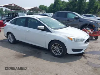 2015 Ford Focus SE with VIN 1FADP3F25FL301755, listed as a IAAI auction lot 42511591 with 89,584 mi miles and . Bid and sale history available at DreamBid. Image 1.