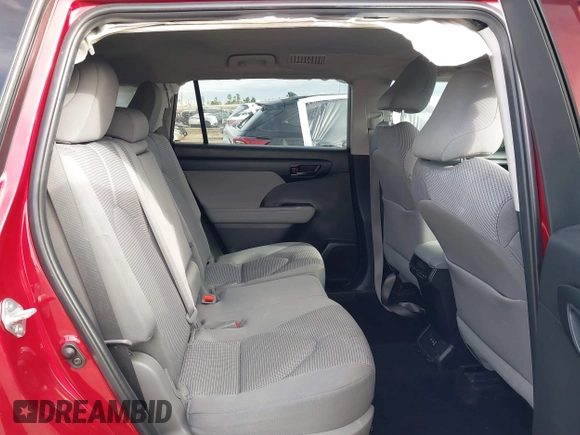 2023 Toyota Highlander L z VIN 5TDKDRAH9PS526978, wystawiony jako IAAI lot #40818784 z przebiegiem 82 801 mil mil oraz . Historia ofert i sprzedaży dostępna na DreamBid. Obrazek 8.
