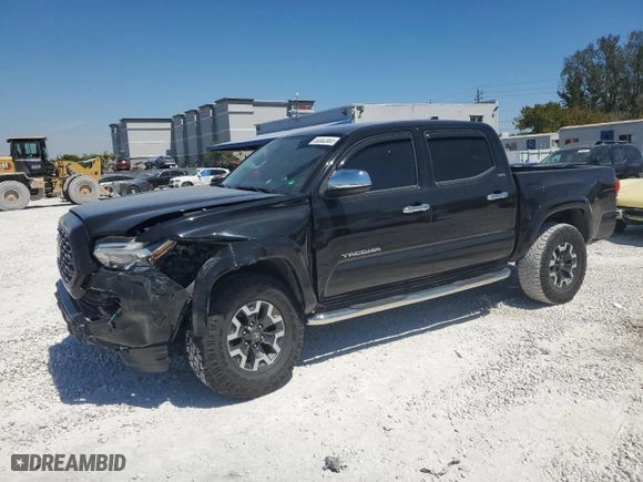 2021 Toyota Tacoma 2WD SR5 with VIN 5TFAZ5CNXMX099521, listed as a Copart auction lot 50082865 with 60,676 mi miles and Salvage Title. Bid and sale history available at carsss.com. Image 1.