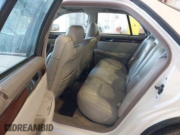 1998 Cadillac Seville STS z VIN 1G6KY5493WU908261, wystawiony jako IAAI lot #41933423 z przebiegiem 179 479 mil mil oraz . Historia ofert i sprzedaży dostępna na DreamBid. Obrazek 8.