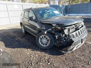 2018 Jeep Grand Cherokee Laredo E with VIN 1C4RJFAG4JC326631, listed as a IAAI auction lot 41191061 with 115,451 mi miles. Bid and sale history available at carsss.com. Image 1.
