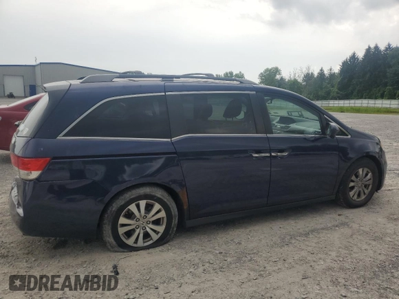 2014 Honda Odyssey EX-L with VIN 5FNRL5H63EB013483, listed as a Copart auction lot 63002435 with 127,059 mi miles and Salvage title. Bid and sale history available at DreamBid. Image 3.