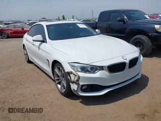 2015 BMW 4 Series 428i with VIN WBA4A9C57FGL86164, listed as a IAAI auction lot 42629769 with 123,984 mi miles and . Bid and sale history available at DreamBid. Image 1.