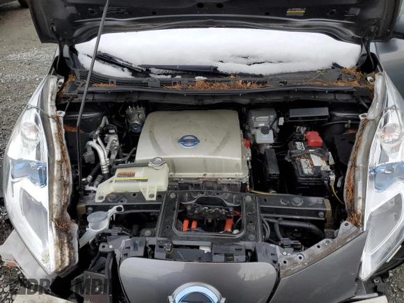 2015 Nissan LEAF SL z VIN 1N4AZ0CP2FC331579, wystawiony jako Copart lot #44030985 z przebiegiem 59 732 mil mil oraz Szkoda całkowita • Salvage title. Historia ofert i sprzedaży dostępna na DreamBid. Obrazek 11.