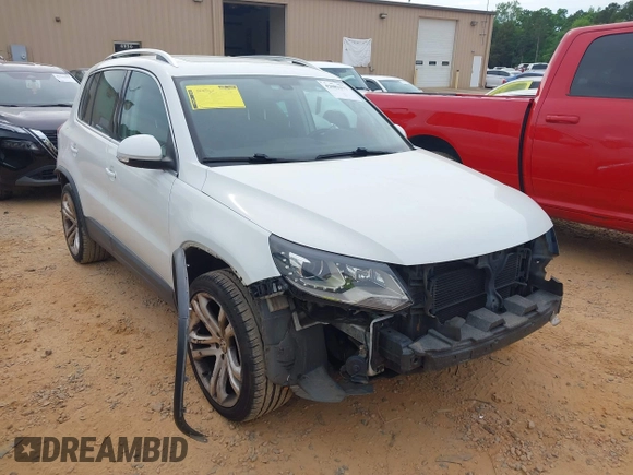 2016 Volkswagen Tiguan S with VIN WVGBV7AXXGW585445, listed as a IAAI auction lot 42083377 with 111,011 mi miles and . Bid and sale history available at DreamBid. Image 1.