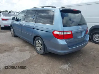 2007 Honda Odyssey EX-L with VIN 5FNRL38647B085123, listed as a IAAI auction lot 42154519 with 168,587 mi miles and . Bid and sale history available at carsss.com. Image 3.