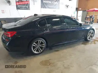 2019 BMW 7 Series 750i xDrive with VIN WBA7F2C51KB239044, listed as a IAAI auction lot 42756026 with 65,028 mi miles and . Bid and sale history available at DreamBid. Image 4.