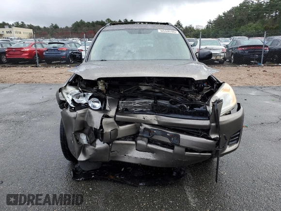 2011 Toyota RAV4 with VIN JTMBF4DVXBD042935, listed as a Copart auction lot 52228705 with 94,849 mi miles and Salvage Title. Bid and sale history available at carsss.com. Image 5.