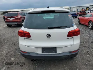 2014 Volkswagen Tiguan SE z VIN WVGAV3AX5EW551477, wystawiony jako Copart lot #55773245 z przebiegiem 153 437 mil mil oraz Czysty tytuł • Clean title. Historia ofert i sprzedaży dostępna na DreamBid. Obrazek 6.