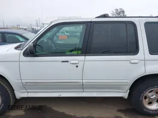 1998 Ford Explorer XL z VIN 1FMZU32E9WZA44004, wystawiony jako IAAI lot #41720181 z przebiegiem 137 267 mil mil oraz . Historia ofert i sprzedaży dostępna na DreamBid. Obrazek 14.