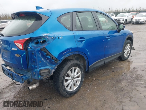 2014 Mazda CX-5 Sport with VIN JM3KE4BE6E0336504, listed as a IAAI auction lot 41961244 with 125,150 mi miles. Bid and sale history available at carsss.com. Image 4.