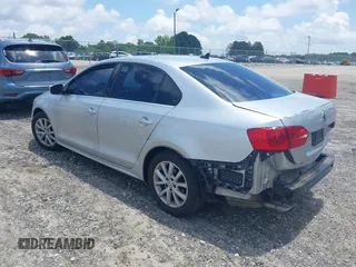 2014 Volkswagen Jetta SE with VIN 3VWD07AJ6EM240396, listed as a IAAI auction lot 42503653 with 146,920 mi miles and . Bid and sale history available at DreamBid. Image 3.