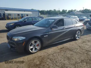 2014 BMW 5 Series 535i xDrive with VIN WBA5B3C52ED530492, listed as a Copart auction lot 61566245 with 111,204 mi miles and Salvage title. Bid and sale history available at DreamBid. Image 1.
