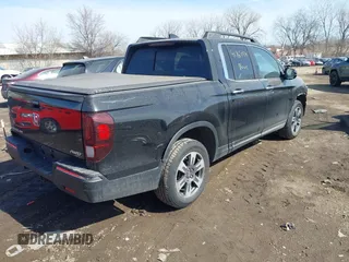 2019 Honda Ridgeline RTL-E with VIN 5FPYK3F7XKB014406, listed as a IAAI auction lot 41765154 with 65,209 mi miles and . Bid and sale history available at DreamBid. Image 4.