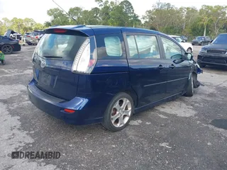 2009 Mazda 5 Sport with VIN JM1CR29L390355978, listed as a IAAI auction lot 41609117 with 118,588 mi miles and . Bid and sale history available at DreamBid. Image 4.