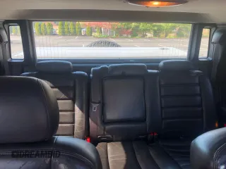 2006 Hummer H2 with VIN 5GRGN22U56H102463, listed as a Copart auction lot 54819425 with 100,096 mi miles and Clean Title. Bid and sale history available at carsss.com. Image 12.