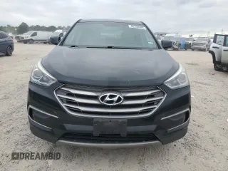 2017 Hyundai Santa Fe 2.4L z VIN 5NMZTDLB8HH046366, wystawiony jako Copart lot #52258495 z przebiegiem 77 013 mil mil oraz Czysty tytuł • Clean title. Historia ofert i sprzedaży dostępna na DreamBid. Obrazek 5.