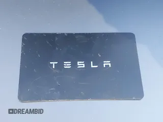 2021 Tesla Model Y Performance with VIN 5YJYGDEF6MF252877, listed as a IAAI auction lot 41770770 with 58,550 mi miles and . Bid and sale history available at DreamBid. Image 11.