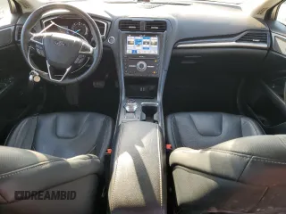 2019 Ford Fusion Hybrid Titanium with VIN 3FA6P0RU0KR277431, listed as a Copart auction lot 48234545 with 87,043 mi miles and Salvage Title. Bid and sale history available at carsss.com. Image 8.