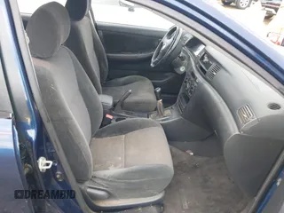 2003 Toyota Corolla CE with VIN 2T1BR32E33C029785, listed as a IAAI auction lot 42147204 with 284,900 mi miles and . Bid and sale history available at DreamBid. Image 5.